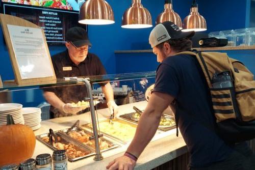 Student ordering food at dining services